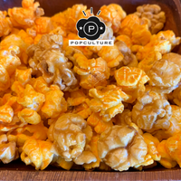 Extra G.O.A.T.™ - Extra Buttery Caramel + Extra Cheesy Popcorn