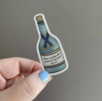 Champagne bottle What a shame she's fucked in the head sticker