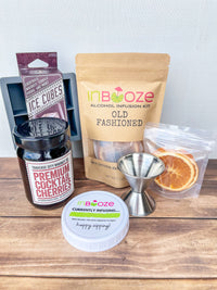 Whiskey lovers gift box from InBooze with an alcohol infusion kit, boozy cherries and more! Made in Michigan.