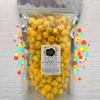 Extra G.O.A.T.™ - Extra Buttery Caramel + Extra Cheesy Popcorn
