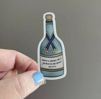 Champagne bottle What a shame she's fucked in the head sticker